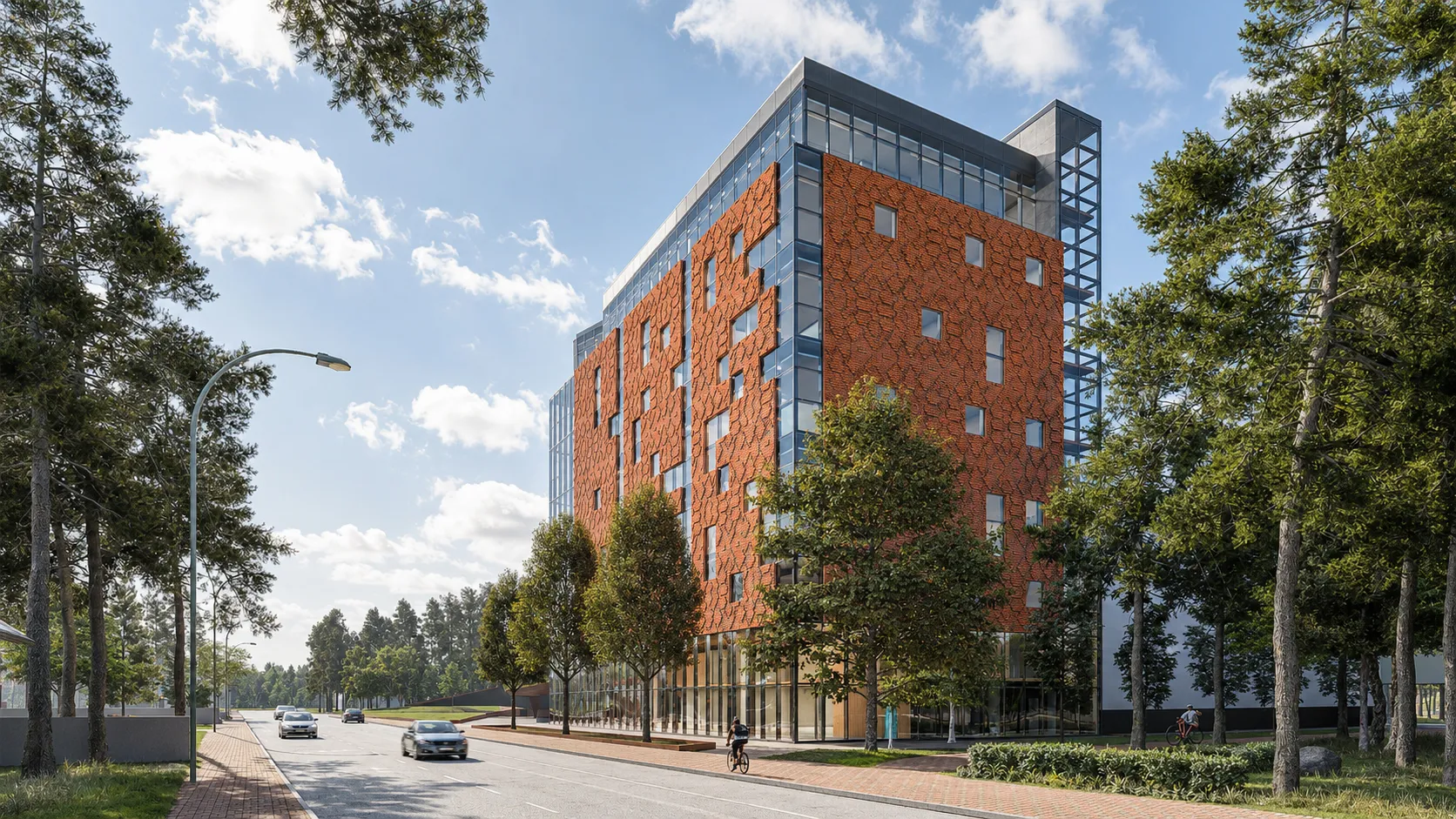 Mid-rise university building with a red parametric brick facade and a glass curtain wall on a tree-lined street in Irpin, Ukraine