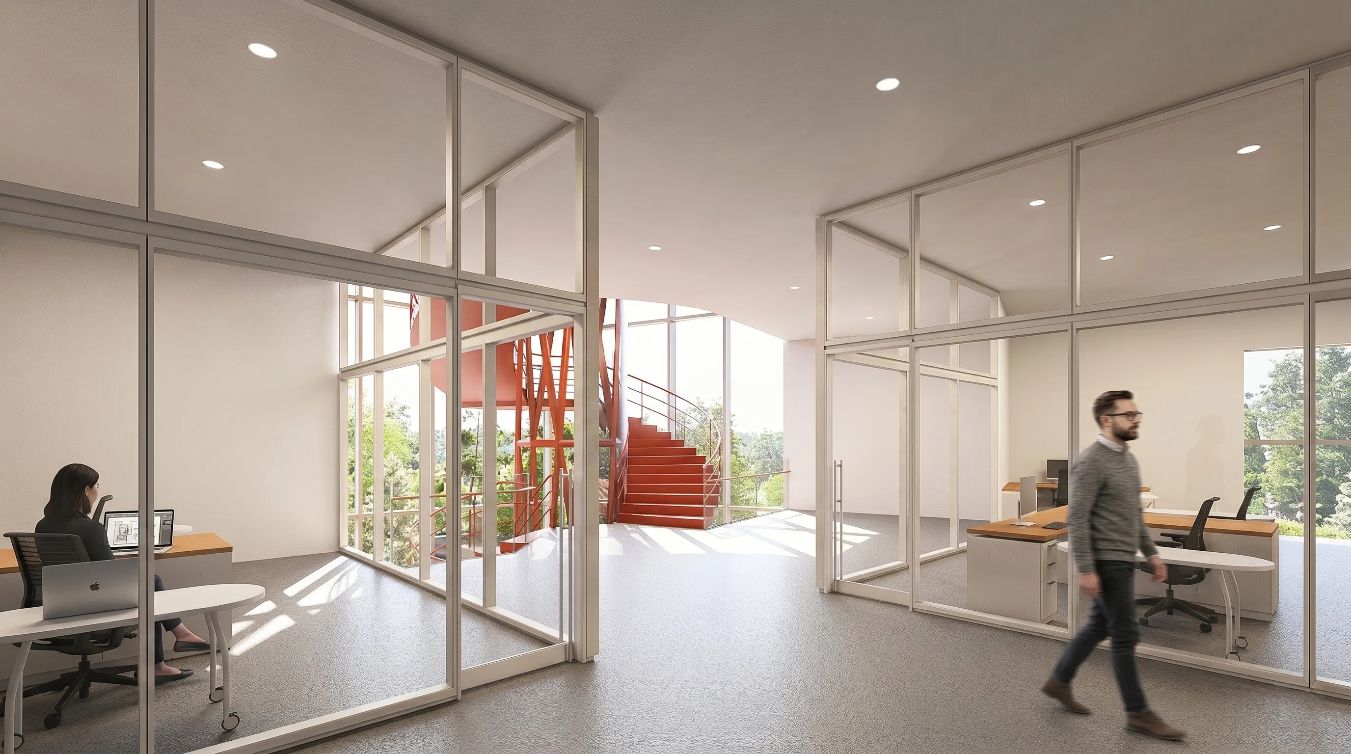 University office floor with glass-partitioned rooms and a red spiral stair behind glass in Irpin, Ukraine