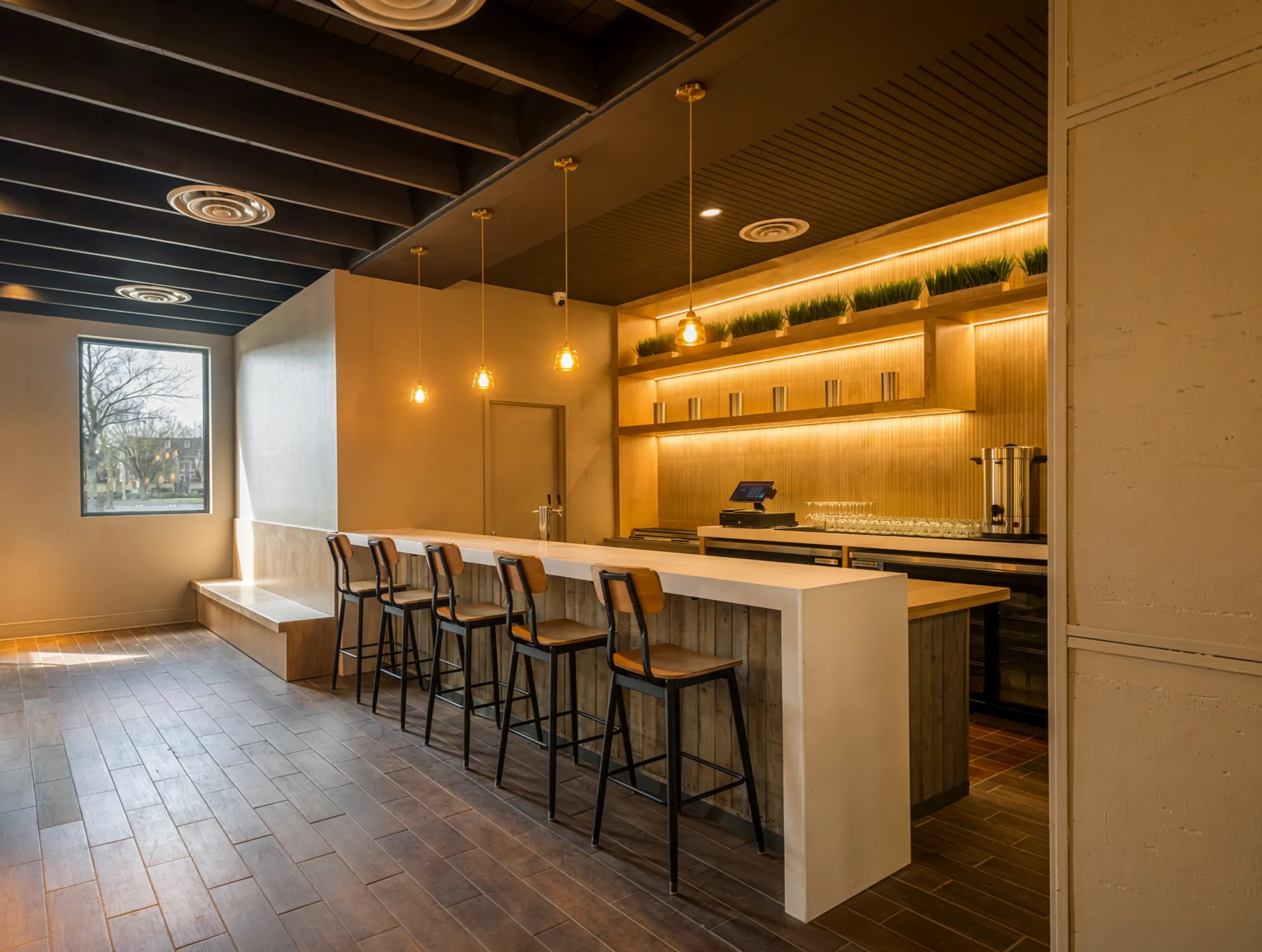 Service bar with a light-wood counter, reclaimed-wood base, and backlit shelving in a hot pot restaurant
