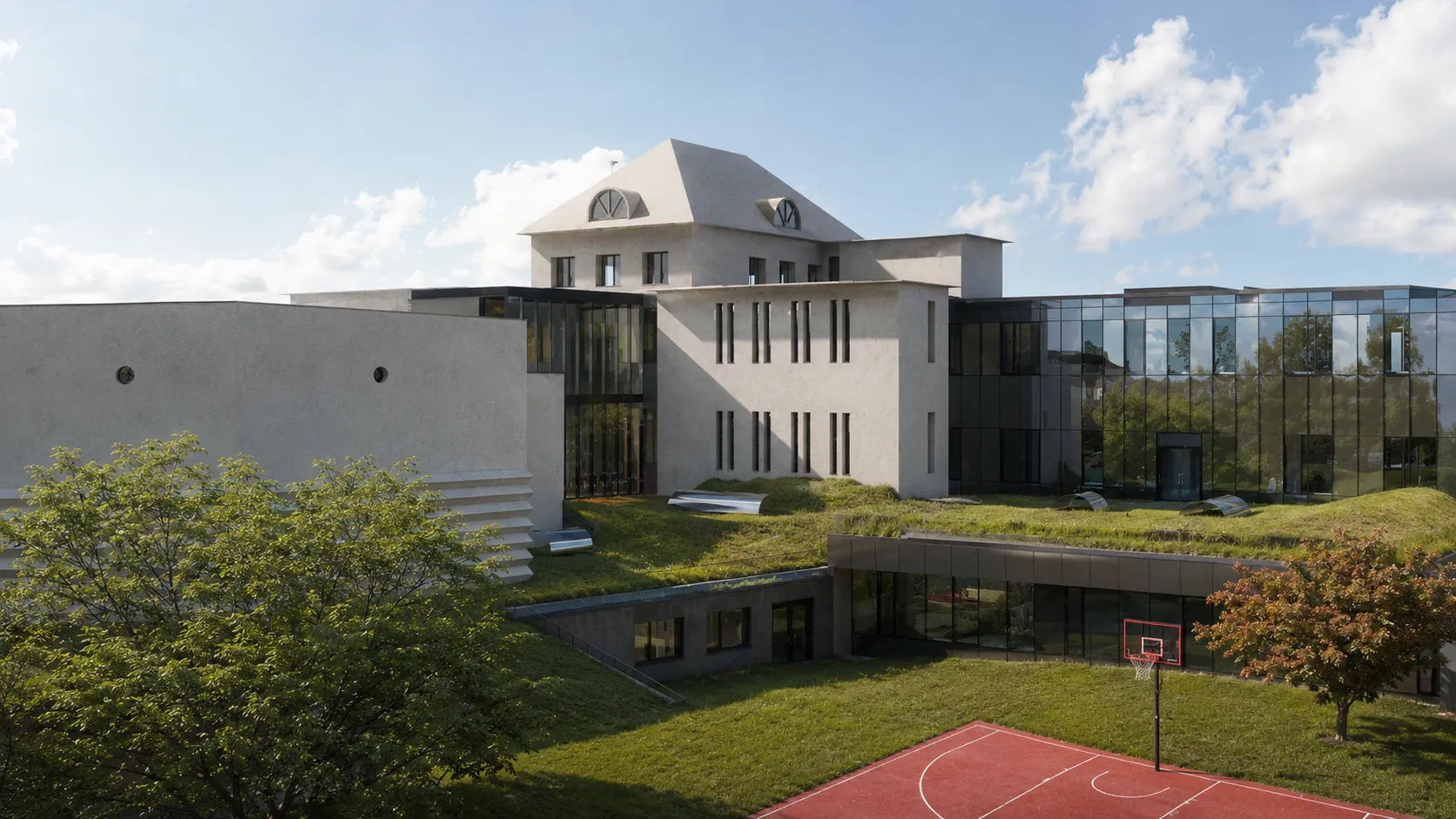 High school campus with a white mansard building joined to glass additions and green roofs near a basketball court in Prague